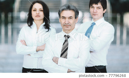 portrait business working group standing in office. 77796268
