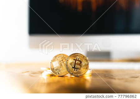 Crypto coins on the desk,conceptual image for crypto currency Crypto coins on the desk,conceptual image for crypto currency 77796862