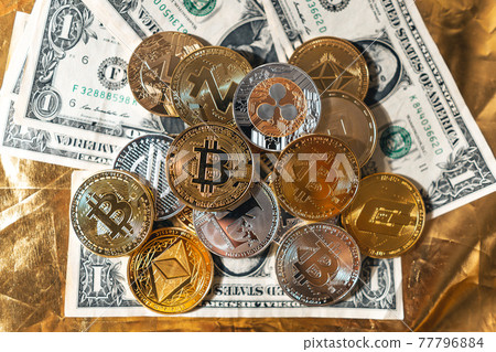 Crypto coins on gold background Crypto coins on gold background 77796884