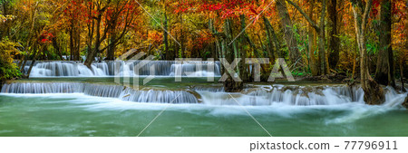 Colorful majestic waterfall in national park forest during autumn, panorama - Image Colorful majestic waterfall in national park forest during autumn, panorama - Image 77796911