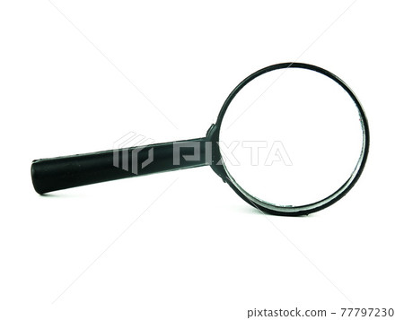 close up. magnifying glass in hand businessman.photo with copy s 77797230