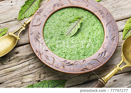 Green sorrel soup,vegetarian cuisine 77797277