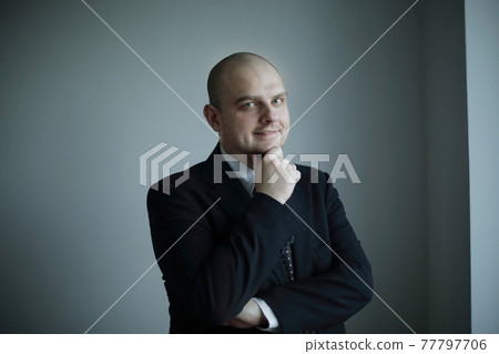 close up. thoughtful businessman looking at copy space 77797706