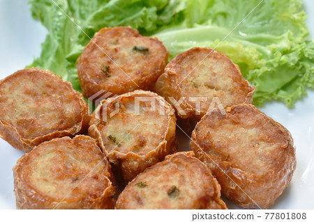 deep fried mashed crab meat and pork roll Chinese food on plate dipping sweet plum sauce deep fried mashed crab meat and pork roll Chinese food on plate dipping sweet plum sauce 77801808