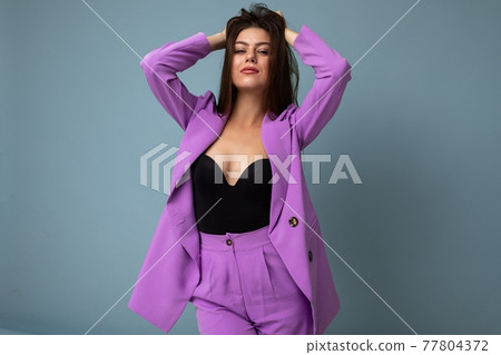 Young brunette woman sexy nice-looking attractive charming elegant fashionable serious isolated over 77804372