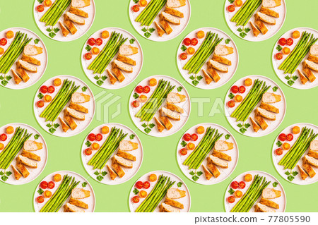 Roasted chicken breast with asparagus and tomatoes Roasted chicken breast with asparagus and tomatoes 77805590