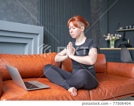 Coach girl folded her arms in meditative pose Coach girl folded her arms in meditative pose 77806404