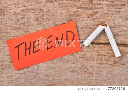 Message the end, broken cigarette. Message the end, broken cigarette. 77807136