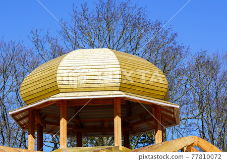 new wooden building frame with a round domed tower new wooden building frame with a round domed tower 77810072
