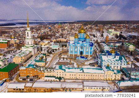 Aerial view of the Nativity-Bogoroditsky monastery surrounded by residential buildings in Zadonsk 77810241