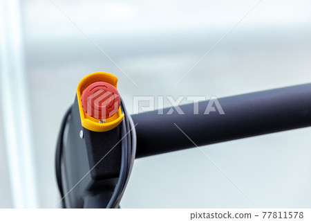 The red emergency button or stop button for Hand press. 77811578