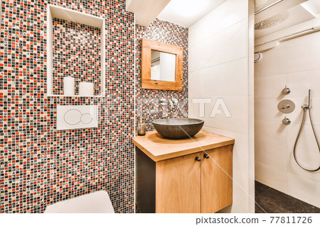 Bathroom with marble walls Bathroom with marble walls 77811726