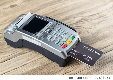 Credit card swiping machine to pay.  77811733