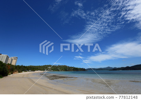 White beach with deep blue sky and clear sea From Hamilton Island, Australia 77812148