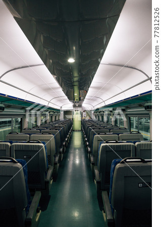 Inside of Korean train. Empty seats 77812526