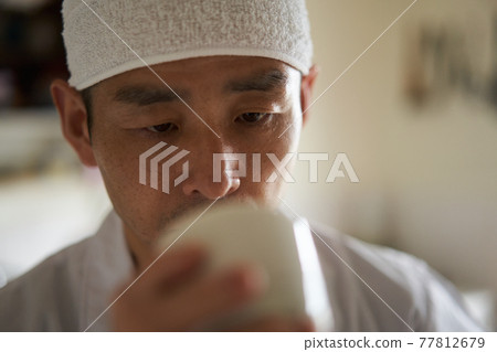 Mr. Mori tasting sake Mr. Mori tasting sake 77812679