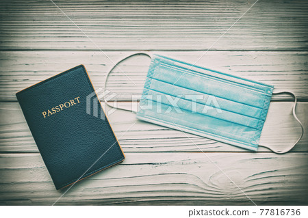 Coronavirus pandemic restrictions on travel passport and face mask. Vaccine certificate Corona viruse testing screening of travelers tourists Coronavirus pandemic restrictions on travel passport and face mask. Vaccine certificate Corona viruse testing screening of travelers tourists 77816736