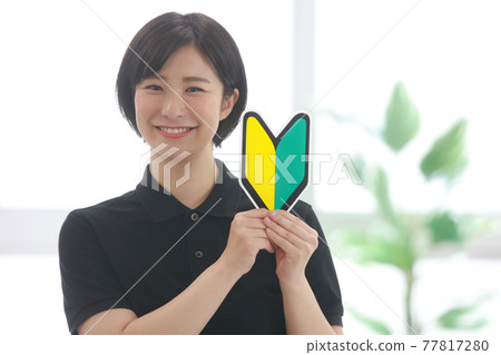 Image of a sports gym instructor with a beginner mark 77817280