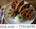 Orange, dragon fruit, whipped cream and waffle 77818496