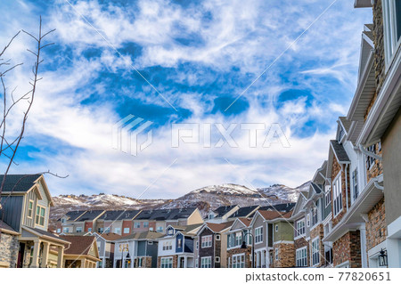 Homes in the valley bordered by scenic nature views of snowy Wasatch Mountains Homes in the valley bordered by scenic nature views of snowy Wasatch Mountains 77820651