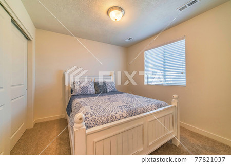 Bedroom interior with double bed window and flush mount dome ceiling light 77821037