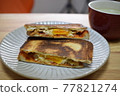 Breakfast with hot sandwich 77821274