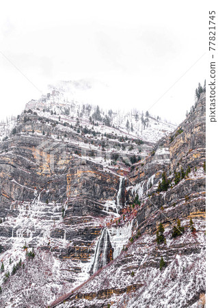Frozen Bridal Veil Falls in Provo Canyon on a beautiful snowy setting in winter 77821745