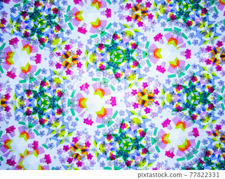 Flower beads and cellophane seen in a kaleidoscope 77822331