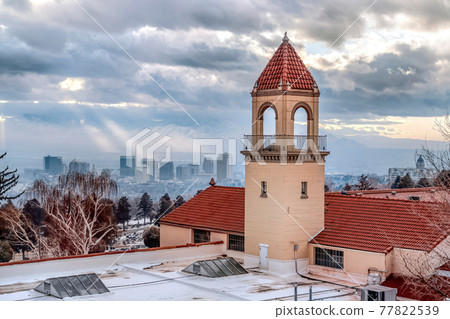 Church rooftop and bell tower with panoramic view of Salt Lake City downtown 77822539