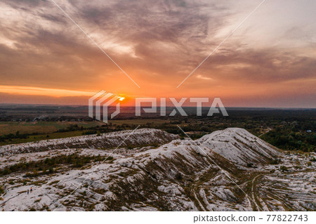 White mountains from phosphorus and gypsum wastes, industrial wastes formed mountains, business activity in Ukraine. 77822743