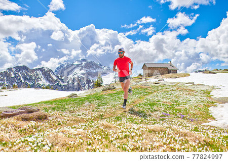 Marathon window runner trains in the mountains in altitude Marathon window runner trains in the mountains in altitude 77824997