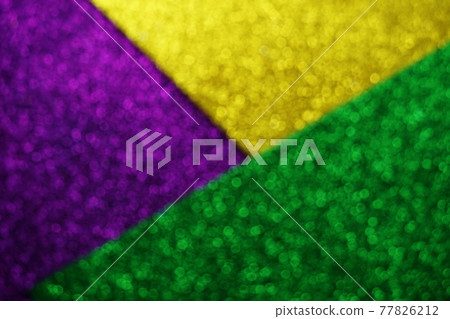 Mardi Gras with Green Purple and gold Light bokeh Background Mardi Gras with Green Purple and gold Light bokeh Background 77826212