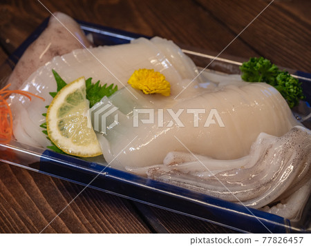 Squid sashimi with head and geso. Squid sashimi with head and geso. 77826457