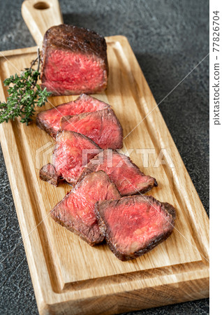 Slices of beef steak 77826704
