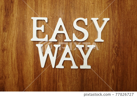 Easy Way word alphabet letters on wooden background 77826727