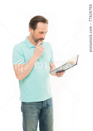 Hes studying business. Bearded man reading book. Senior Hes studying business. Bearded man reading book. Senior 77826768