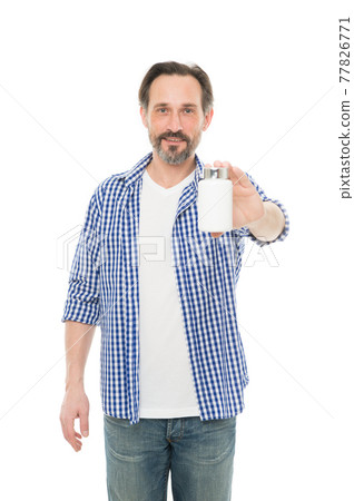 Health is wealth. Bearded man holding vitamin pill container.  77826771