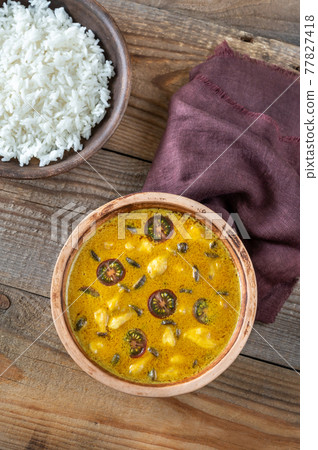 Bowl of yellow curry Bowl of yellow curry 77827418