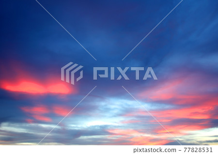 Colorful sunset with clouds in the evening Colorful sunset with clouds in the evening 77828531
