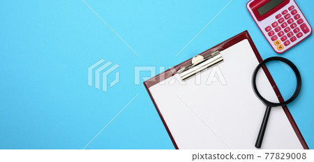 pink calculator, folder with blank white sheets and black magnifier on a blue background. Banner for business pink calculator, folder with blank white sheets and black magnifier on a blue background. Banner for business 77829008