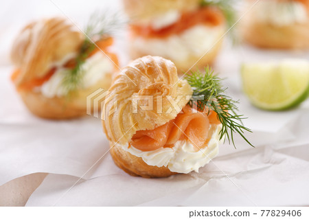 Profiteroles with salmon 77829406