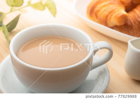Breakfast coffee and croissants Breakfast coffee and croissants 77829988