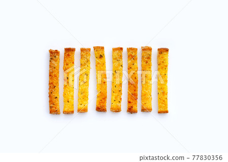 Garlic bread sticks isolated on white Garlic bread sticks isolated on white 77830356