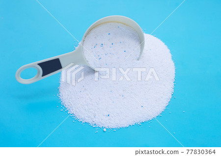Detergent powder with measuring spoon for clothes washing. Laundry concept. 77830364