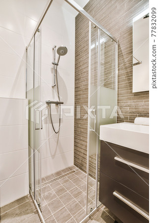 Bathroom with shower cabin and toilet Bathroom with shower cabin and toilet 77832099