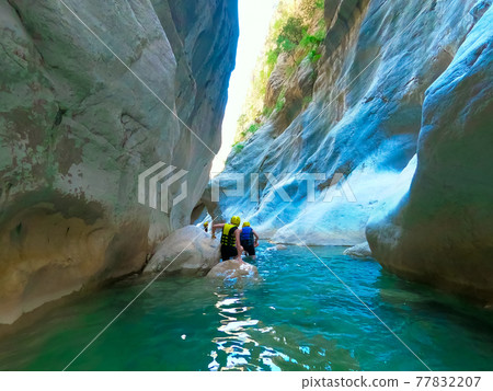 Trekking along the Lycian trail in the canyon of Harmony, near the town of Goynuk Trekking along the Lycian trail in the canyon of Harmony, near the town of Goynuk 77832207