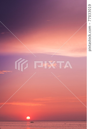 Colorful sunset sky over Baltic Sea, summer evening 77833019