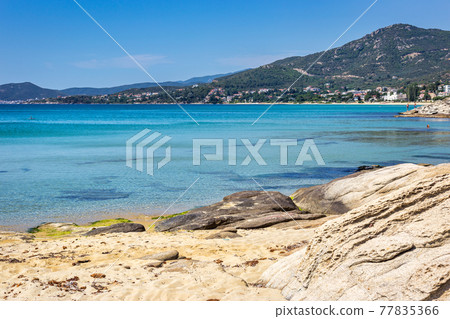 Beautiful beach with turquoise water 77835366