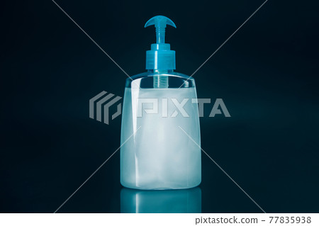 Hand sanitizer on a black background. photo with a copy-space. 77835938