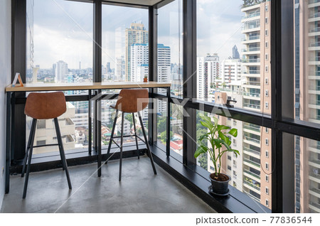 Wooden desk with chairs at corner modern office 77836544